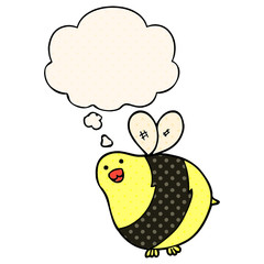 cartoon bee and thought bubble in comic book style