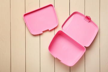 Empty school lunch box on white wooden background