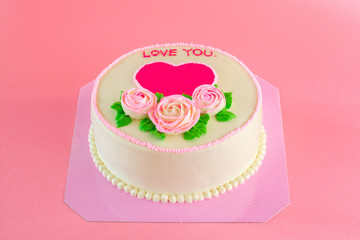 Butter cream of Pink Roses decorated on vanilla pond cake on pink background with copy space served in Birthday Party and wedding. Delicious sweet bakery for someone you love.