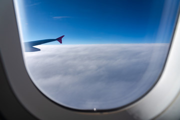 The window of the airplane. A view of porthole window on board an airbus for your travel concept or...