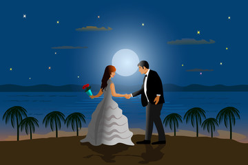 The married couple is dancing on the beach. With the sea and the moon as the background