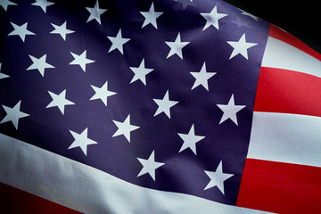 US flag waving in wind on Independence Day in America