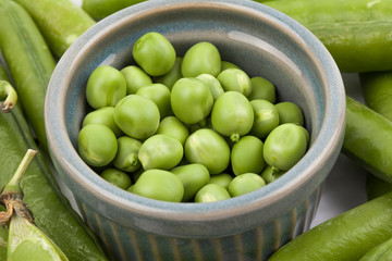 fresh pea pods isolated on white background.