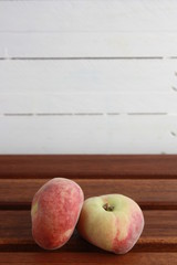 Paraguayan peach on wooden background