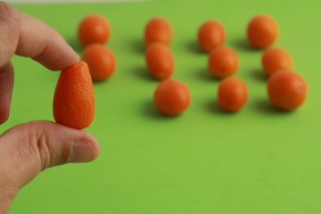 small and delicious orange fruits kumquat