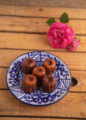 French pastry Caneles de bordeaux rum and vanilla flavor thick caramelized..