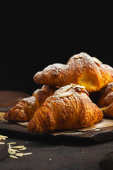 Freshly baked croissant with chocolate close up