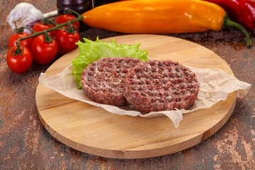 Raw burger cutlet