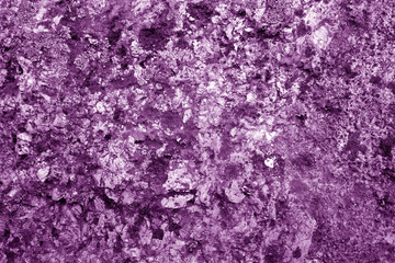 Old stone surface in purple tone.
