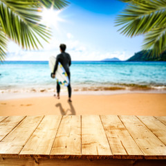 Desk of free space and summer beackground of beach with sea