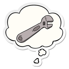 cartoon spanner and thought bubble as a printed sticker