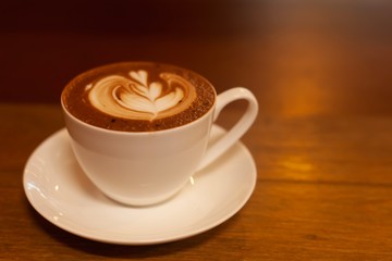 cup of coffee on black background