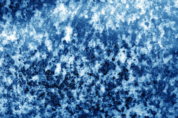 Marble stone background in navy blue tone.