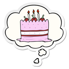 cartoon cake and thought bubble as a printed sticker