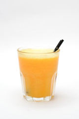 orange cocktail with black straw in a transparent glass, on a white background