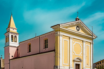 Lady of Angels Church, in the colors pink and yellow in historical town Porec, Croatia