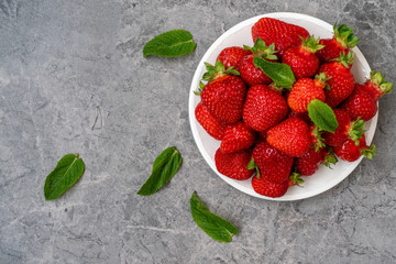 Red strawberry with mint leaves