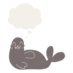 cartoon seal and thought bubble in retro style