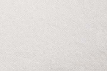 White paper texture for use as a background. High quality photography.