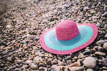 Summer straw hat pamela on the beach