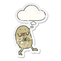 cartoon happy potato and thought bubble as a distressed worn sticker