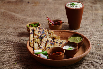 Methi Paratha - A flatbread stuffed with fenugreek leaves and spices
