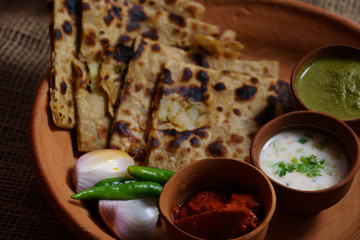 Methi Paratha - A flatbread stuffed with fenugreek leaves and spices