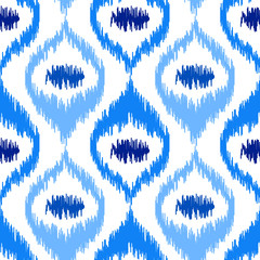 Uzbek ikat silk fabric pattern, indigo blue and white colors.