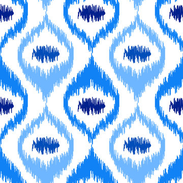Uzbek ikat silk fabric pattern, indigo blue and white colors.