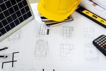 Desk of architects Solar Energy Powered Home Green for reduce global warming.