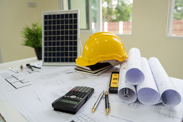 Desk of architects Solar Energy Powered Home Green for reduce global warming.