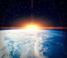 Wonderful sunlight above earth. The elements of this image furnished by NASA.