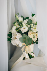 Stylish wedding bouquet on the wedding day. Happy day.
