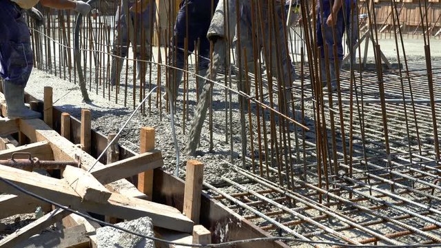 Concrete Pouring During Commercial Concreting Floors of Buildings at the Construction site