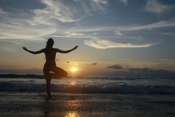 meditation and yoga on the beach / summer vacation concept health beauty, summer vacation yoga classes on the sea shore