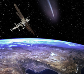 Obraz na płótnie Canvas Space station above the earth. Meteors, comets in space. The elements of this image furnished by NASA.