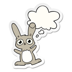 cute cartoon rabbit and thought bubble as a printed sticker