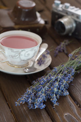 cup of tea with lavender and vintage photo camera