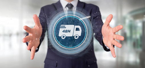 Businessman holding a Fast delivery button with connection 3d rendering