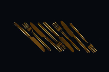 flat lay of metal cutlery isolated on black