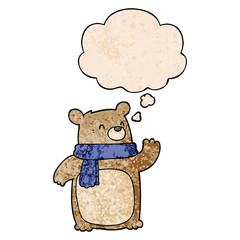 cartoon bear wearing scarf and thought bubble in grunge texture pattern style