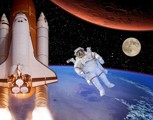 Rocket flies from earth to Mars. Astronaut and moon in the distance. The elements of this image...