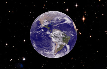 Earth and galaxy, collage. The elements of this image furnished by NASA.