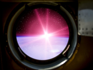 Sunrise, view from spaceship. Elements of this image furnished by NASA.