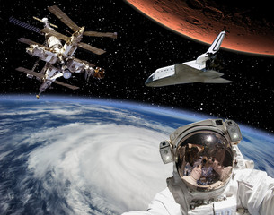 Astronaut, mars and shuttle. The elements of this image furnished by NASA.