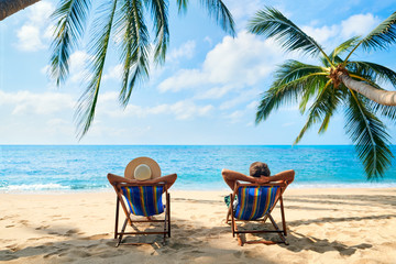 Couple relax on the beach enjoy beautiful sea on the tropical island - 276107140