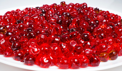 Red caviar close up on a white background