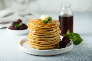 Homemade pancakes with blackberry and syrup