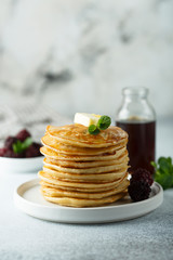 Homemade pancakes with blackberry and syrup