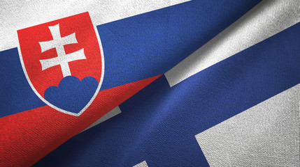 Slovakia and Finland two flags textile cloth, fabric texture